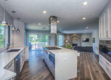 large wooden floor in white kitchen double aspect 640